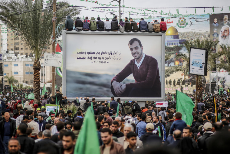 A picture of the martyr Yasser Murtaja press is seen among a