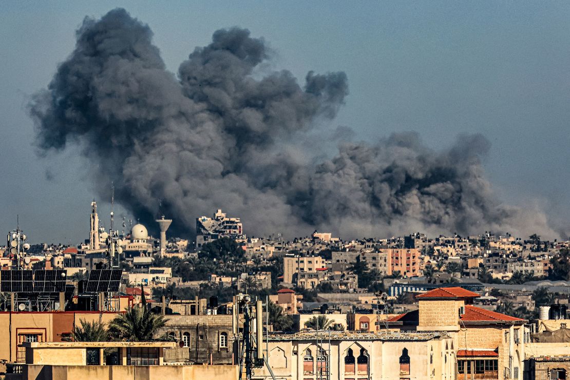 Smoke billows from Israeli bombardment over Khan Younis, as seen from Rafah, Gaza, on December 16.